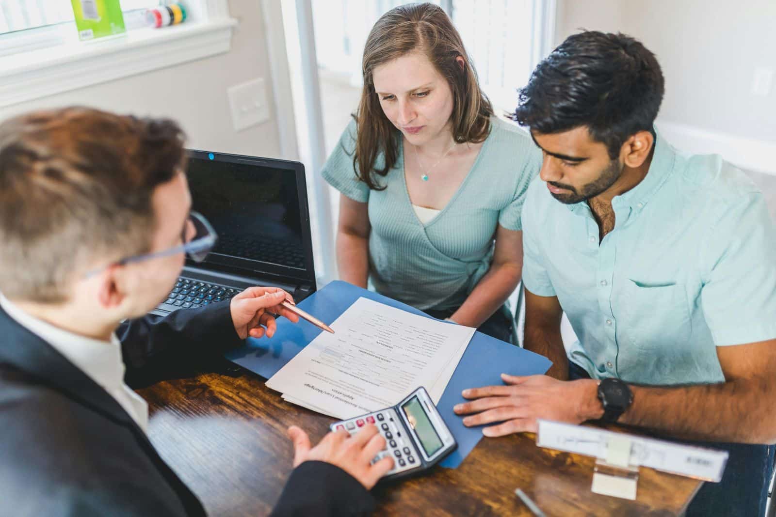 Real estate investor comparing portfolio loan and traditional mortgage financing options